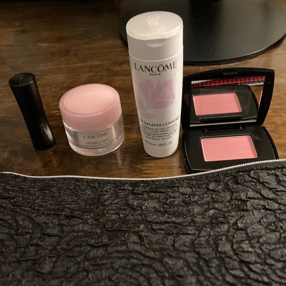 Lancome Black pouch with blush, lipstick, face cream and face wash